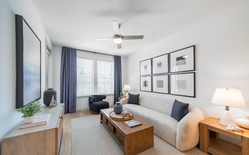 Image of Living Room with White Couch and Two End Tables