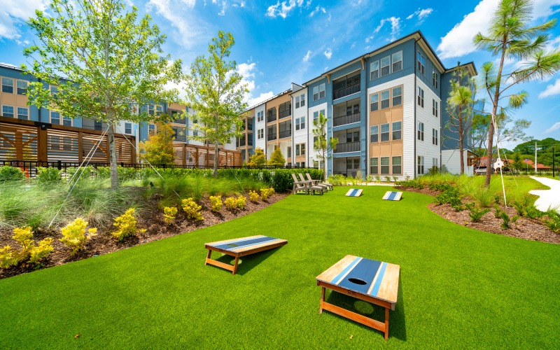 Image of Game Lawn with Cornhole Games on Grass