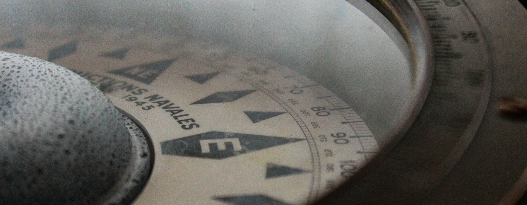 a close-up of a compass